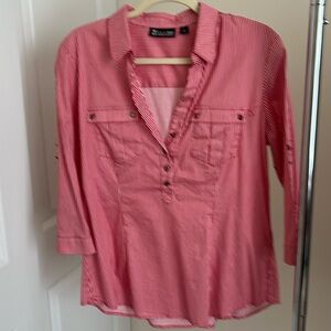 Red and white striped 3/4 length sleeve shirt.